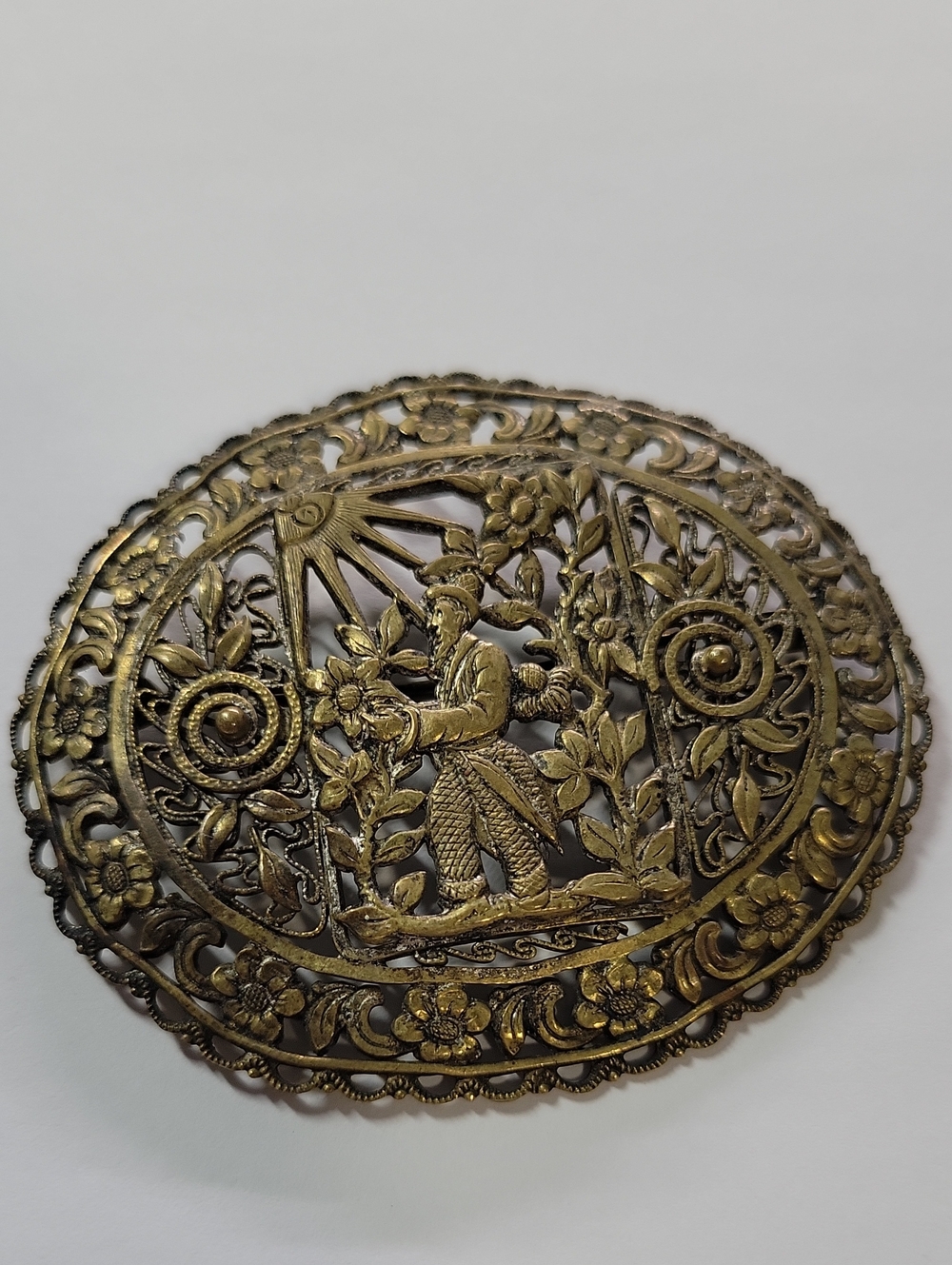 Antique-Style Brass Filigree Oval Brooch with Figurine